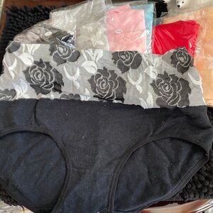 7 pairs of underwear size 3 xl pink grey blue red tan and black.